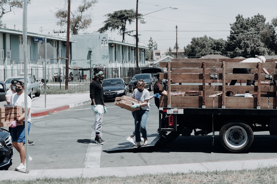 Volunteers loading boxes onto a donation truck